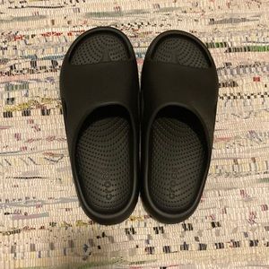 Black slip on Crocs Unisex sandals, men’s size 7, women’s size 9